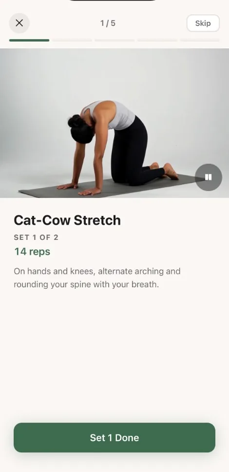 Remedy session screen with a demonstration video of the cat-cow stretch